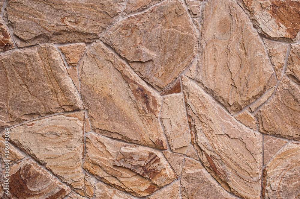 Texture old rock wall made of random stone background Texture old rock wall made of random stone background