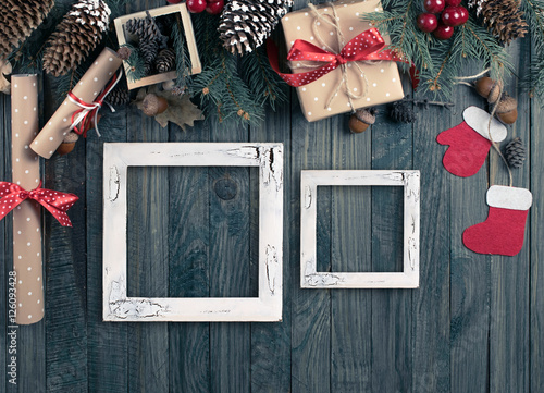 Christmas background with photo frame, spruce, gift box, Santa C