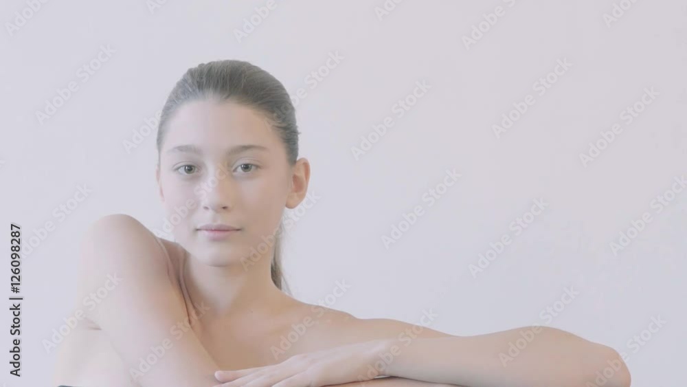 Closeup Beauty portrait of woman face with bright eyes. Skincare concept. Copy space.