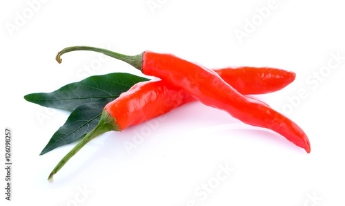 red chili with leaf on white background