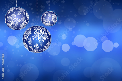 Christmas toys with snowflakes on abstract blue background