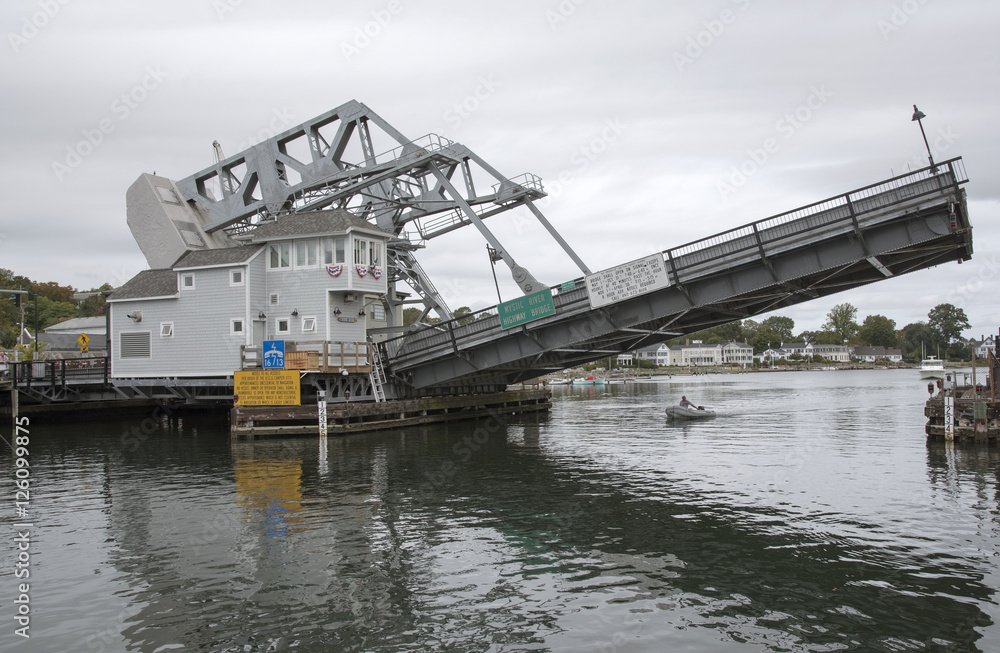 Mystic River highway bridge Connecticut USA - October 2016 - The lifting Bridge which crosses the Mystic River beginning to open for boats to pass