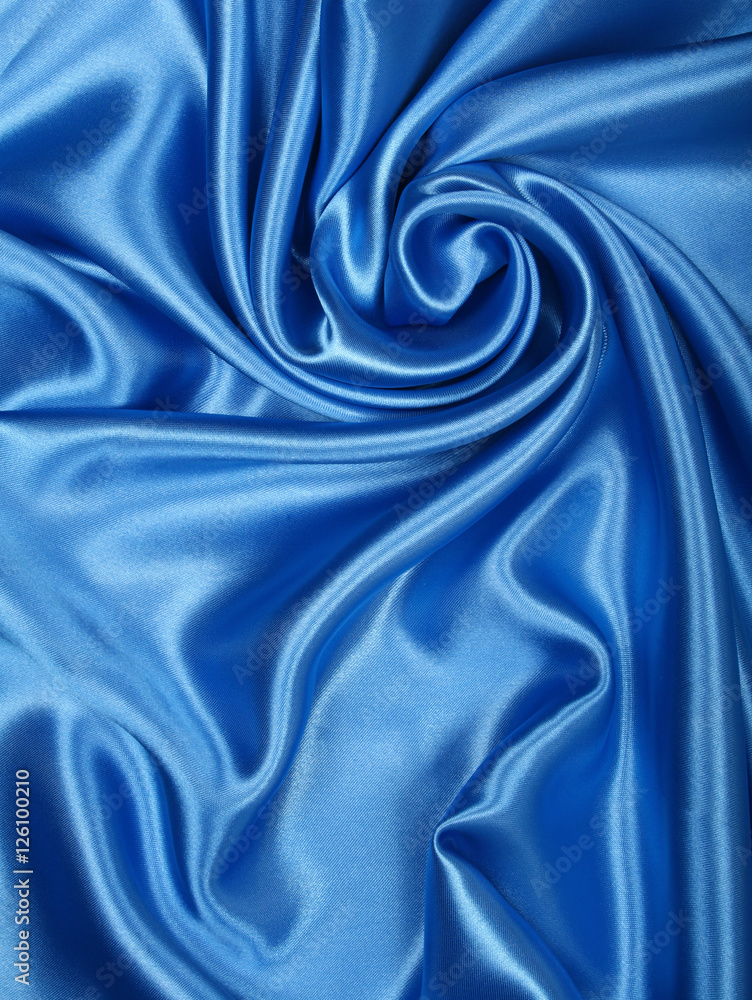 Fototapeta premium Smooth elegant blue silk as background