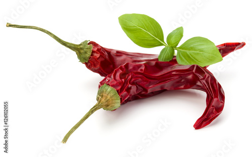 Dried red chili or chilli cayenne pepper isolated on white  back photo