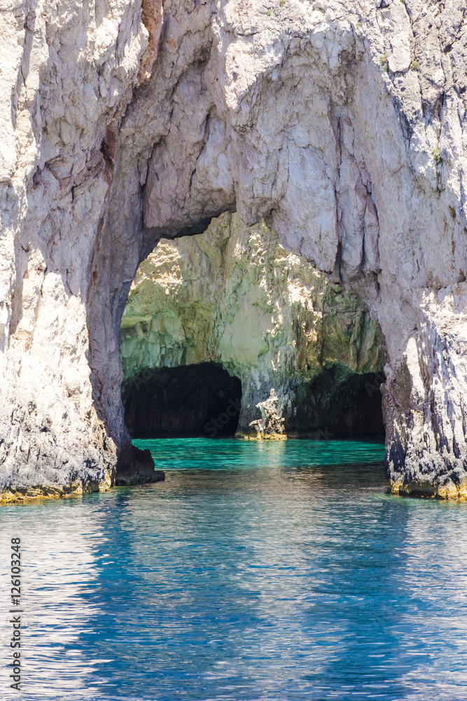 Blue sea caves on Zakynthos island, Greece, with crystal clear waters