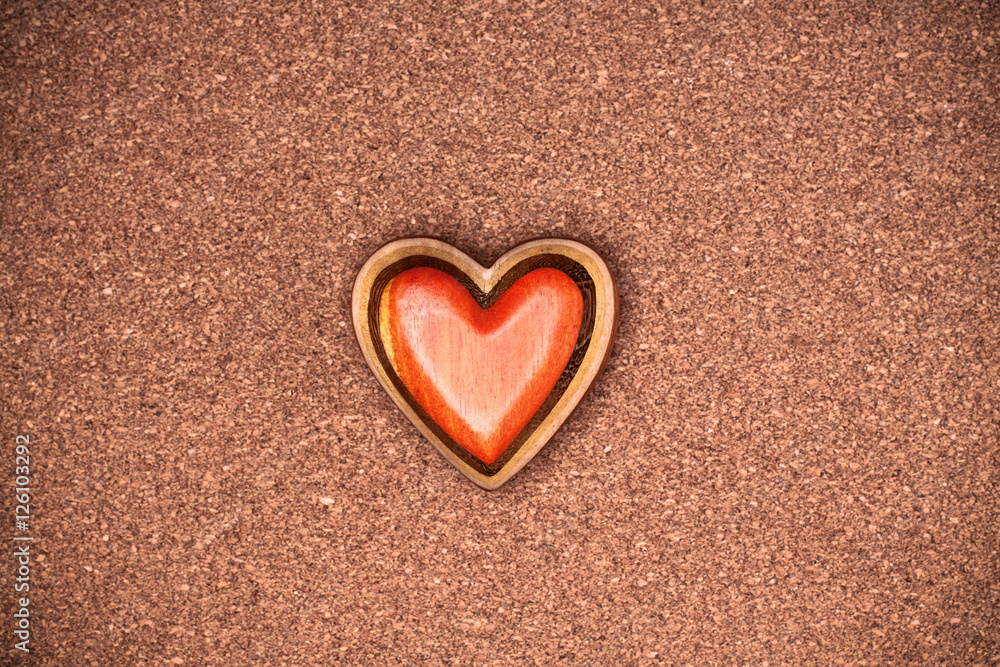One wooden heart on rustic wood background. Valentines days conc One wooden heart on rustic wood background. Valentines days conc