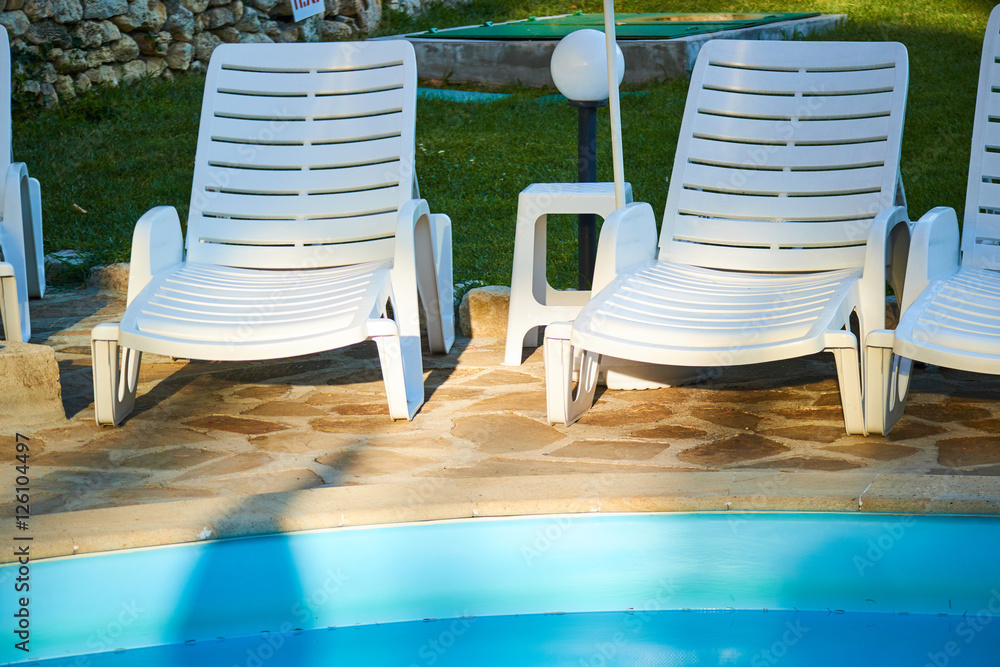 loungers by the pool loungers by the pool