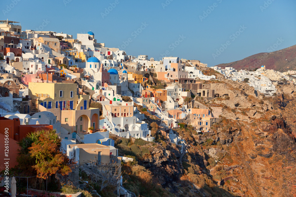 Panorama with hotels and villas with sea view in Oia, Santorini,