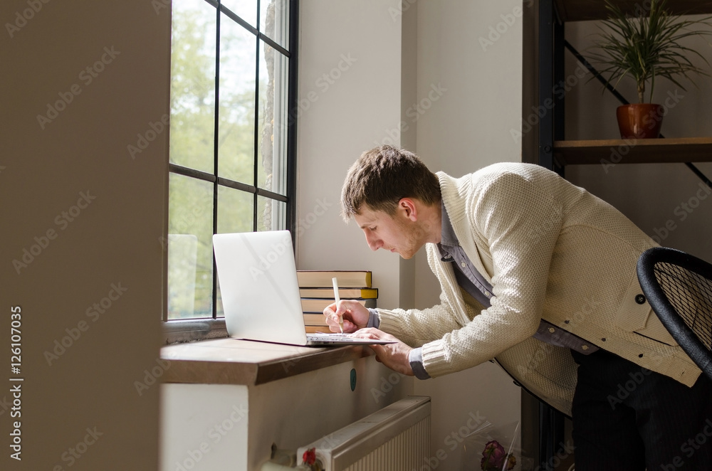 Young man with laptop Young man with laptop
