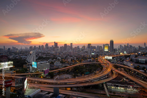 Aerial view of Bangkok city, Night scene with traffic light, Thailand © weerasak