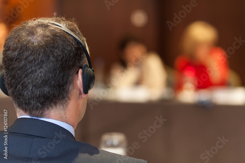 man with headset at the conference