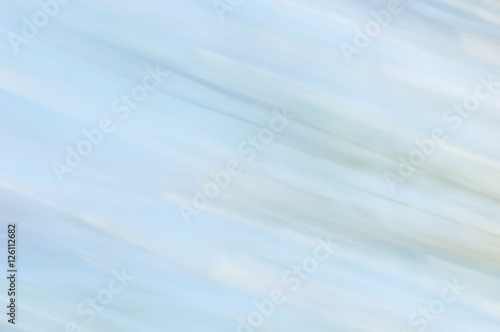 Blurred abstract background. Pale blue and white.