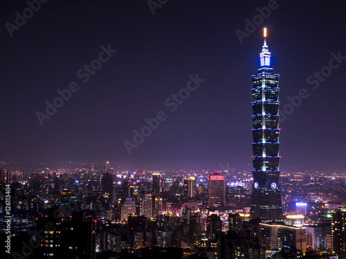 Cityscape nightlife view of Taipei. Taiwan city skyline at twilight time, public scene from view point at Elephant Mountain Hiking Trail in purple tone