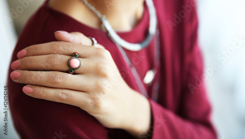 Female hand with stylish ring, closeup