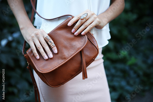 Female hands with bag and s...