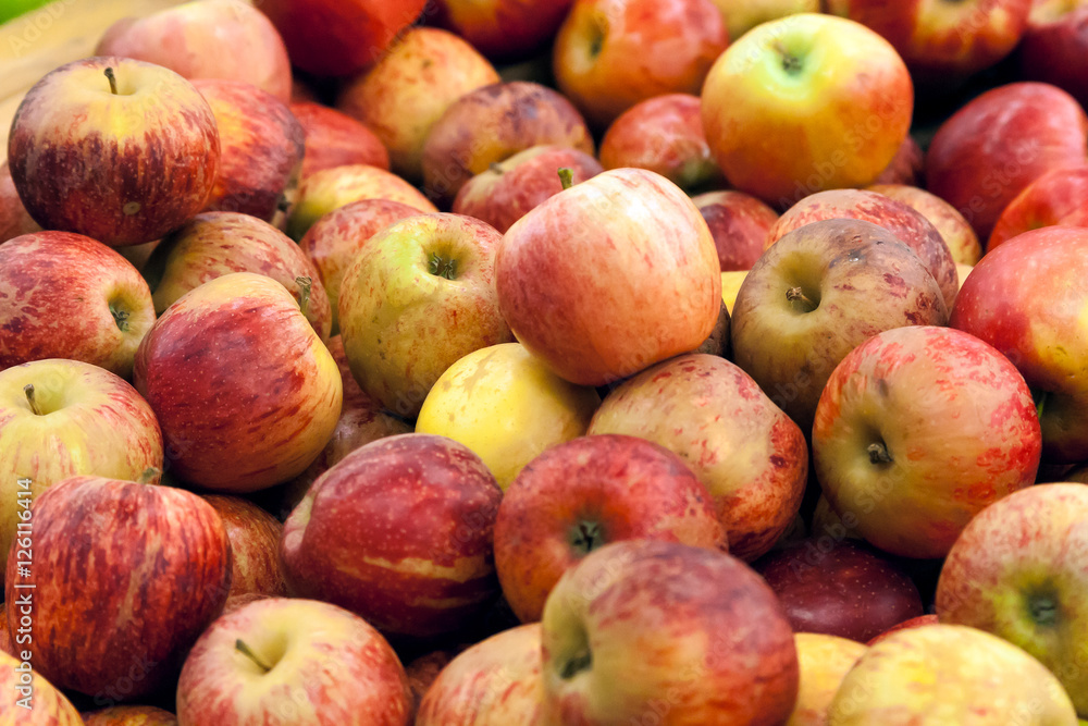 red apples on a counter of shop red apples on a counter of shop