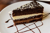 Slice of chocolate cake on plate