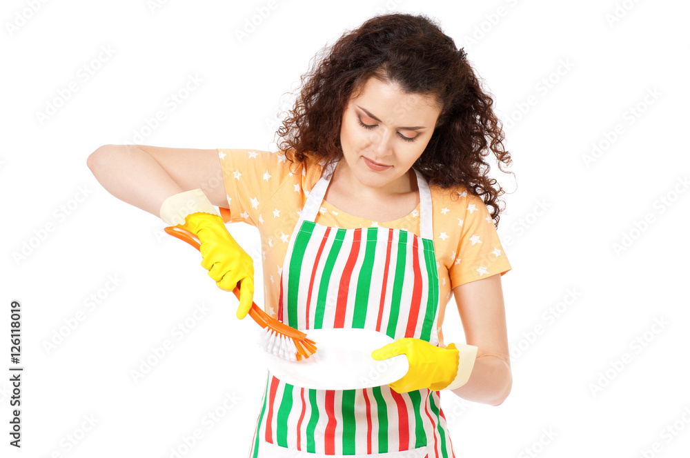 Woman washing dishes, isolated on a white background. Beautiful girl in yellow protective rubber gloves washing white plate. Housekeeper with cleaning tools and products tired of home chores. Woman washing dishes, isolated on a white background. Beautiful girl in yellow protective rubber gloves washing white plate. Housekeeper with cleaning tools and products tired of home chores.
