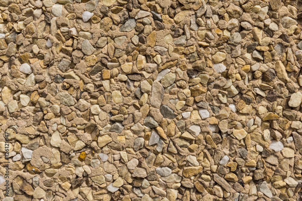 detail of wallcovering with small pieces of different stones texture stone wall detail of wallcovering with small pieces of different stones texture stone wall