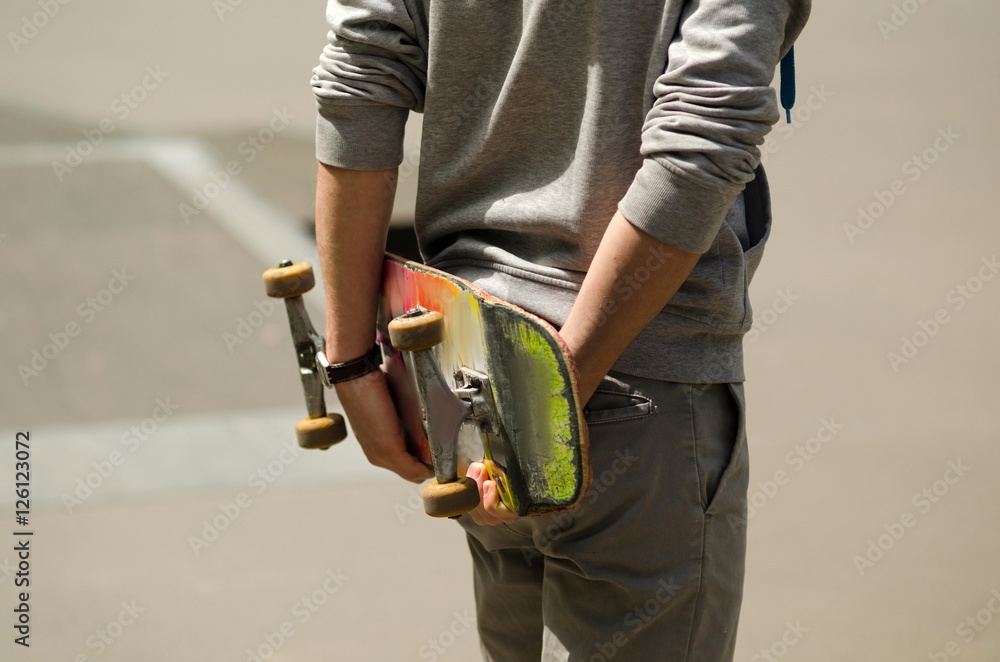 Young man with the skateboard Young man with the skateboard