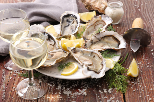 fresh oyster and wine glass photo