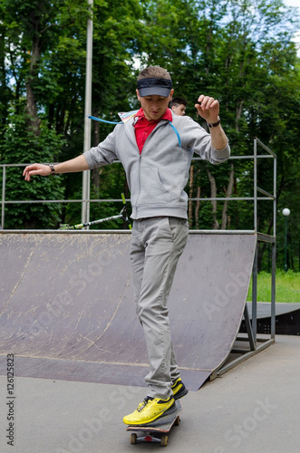 Young man with the skateboard