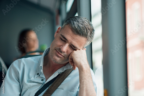Man sleeping on the bus