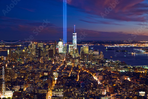 New York City Manhattan night view with light beams in memory of September 11