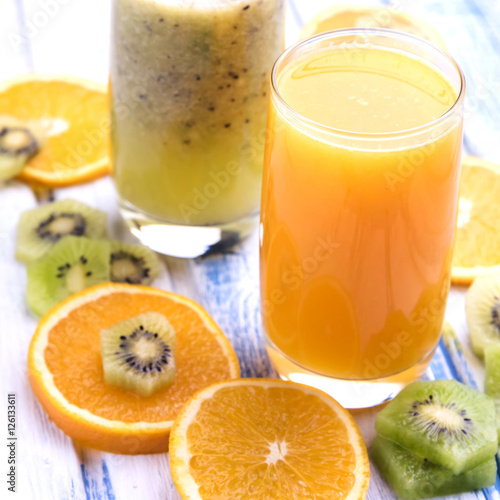 Fresh orange and kiwi  juice in glass 