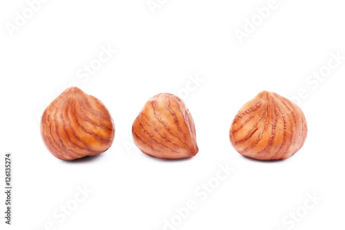 Group healty hazelnuts isolated on white background