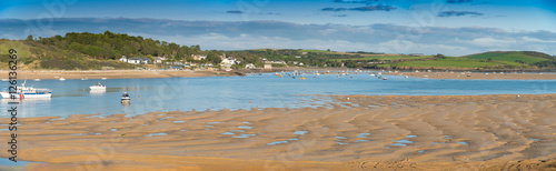 Panorama of the Camel estuary at low tide with the touristic village Rock in Cornwall. View from Padstow on the opposite site of the estuary.