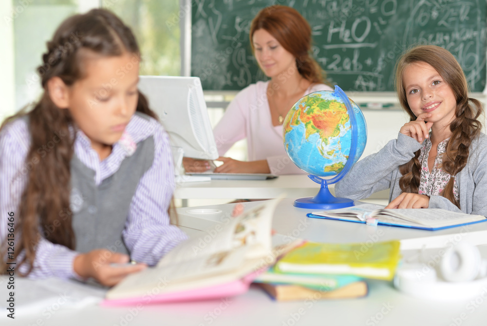 teacher with two girls at lesson teacher with two girls at lesson