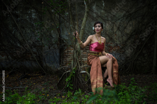 Asian woman wearing dress traditional Thai costume ,beautiful women thai in the past.