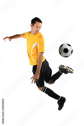 Soccer Player Back Kicking Ball © R. Gino Santa Maria