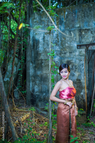 Asian woman wearing dress traditional Thai costume ,beautiful women thai in the past.