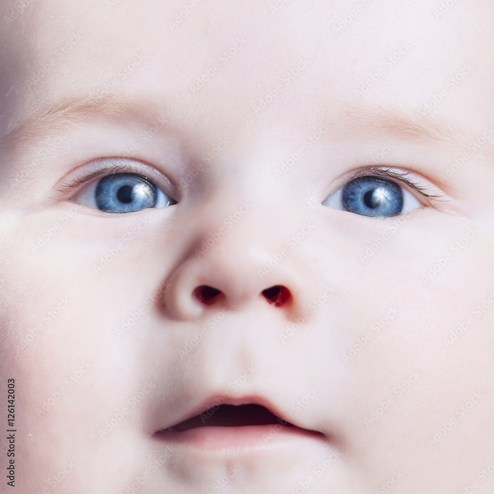 Closeup of baby boy face expressing excitement Closeup of baby boy face expressing excitement