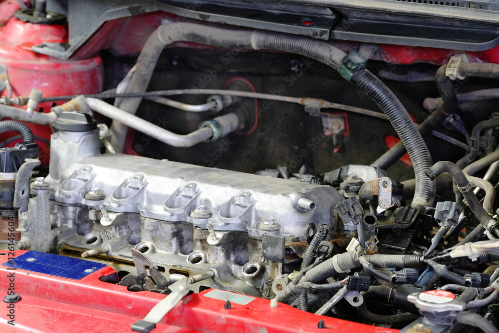 The image of a car engine compartment