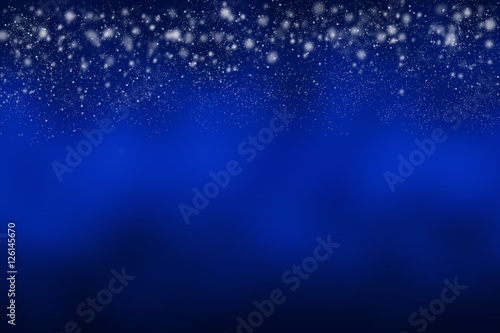 Abstract blue background with white snow falling