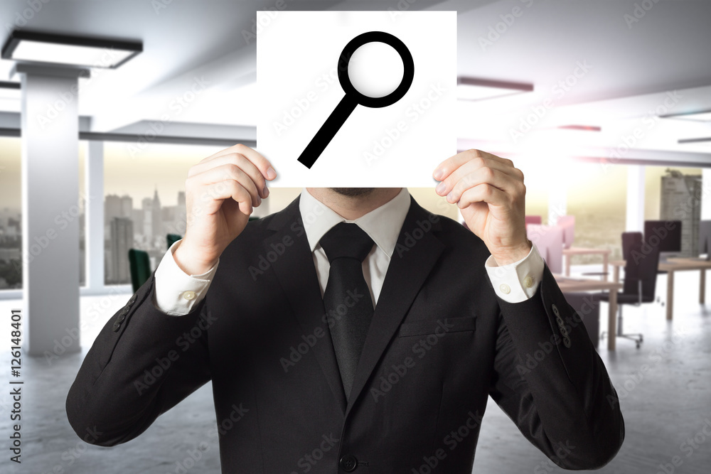 businessman hiding face behind sign loup magnifier businessman hiding face behind sign loup magnifier