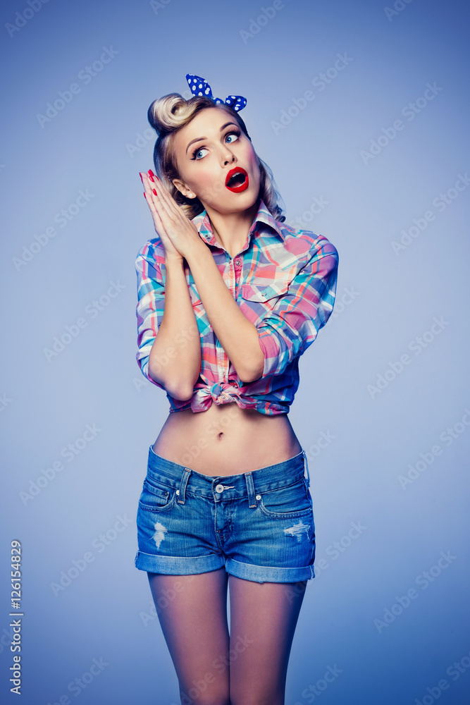 young smiling woman, dressed in pin-up style young smiling woman, dressed in pin-up style