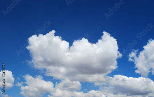                                                  Cloud in the shape of a heart against the blue sky