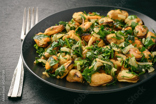 Mussels cooked with parsley, garlic and wine.