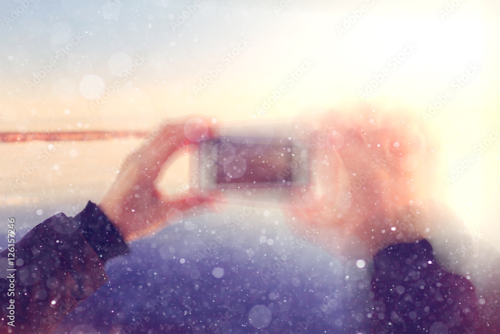 Fototapeta premium blurred winter background with snowflakes for text