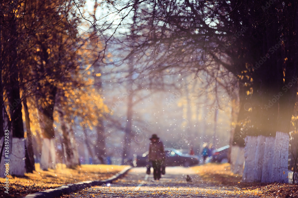 blurred background path in autumn city park blurred background path in autumn city park