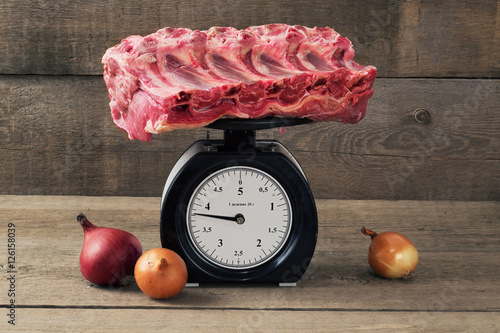 meat on the scales and onions