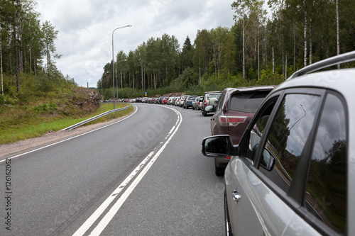 Cars waiting in line to enter the checkpoint Brusnichnoe on the Russian-Finnish border