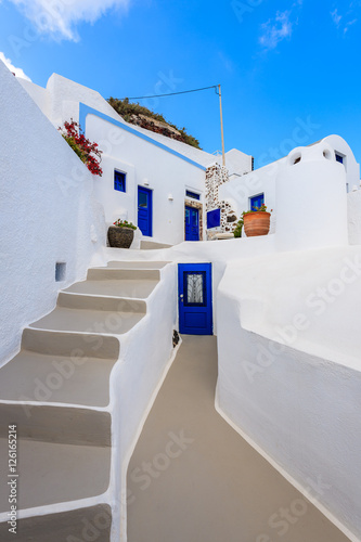 Steps to typical Greek houses in Imerovigli village on Santorini island, Greece