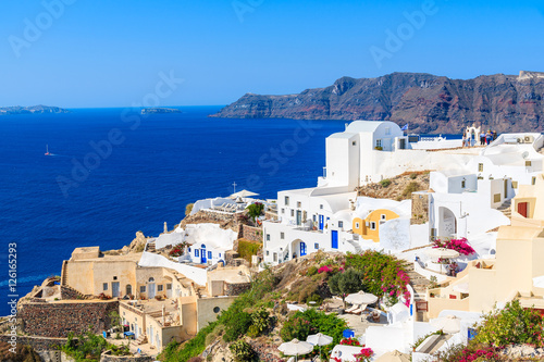 Colorful houses in Oia village on Santorini island, Greece