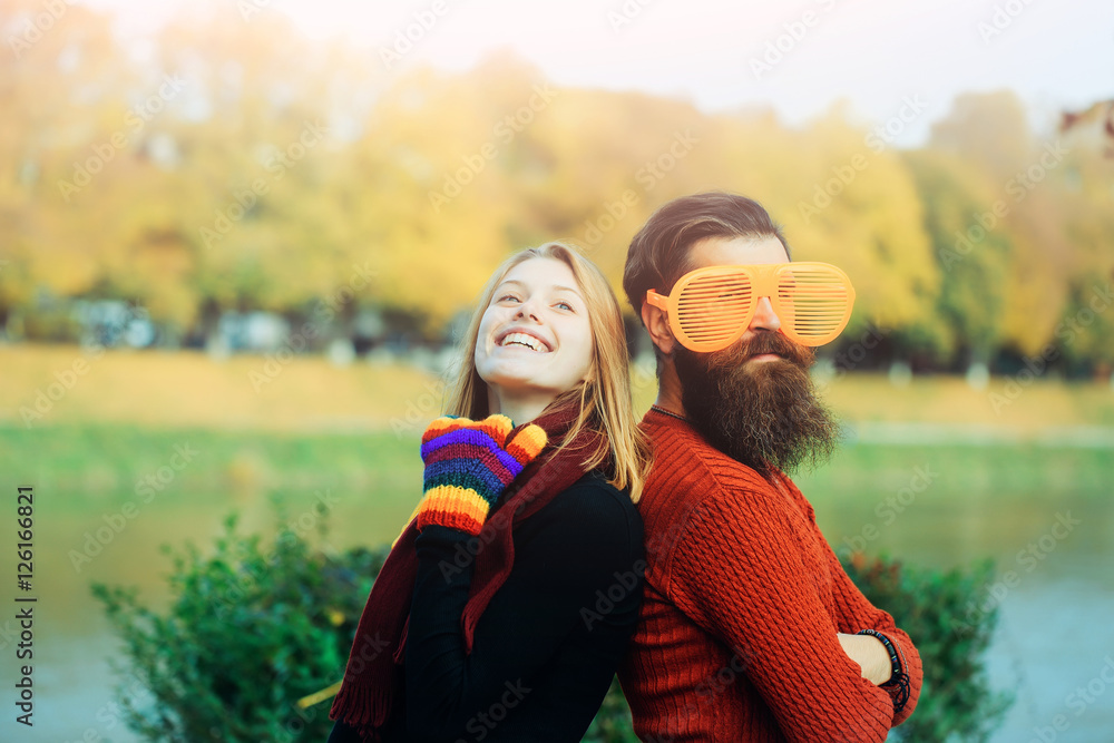 Fototapeta premium Young couple in autumn park