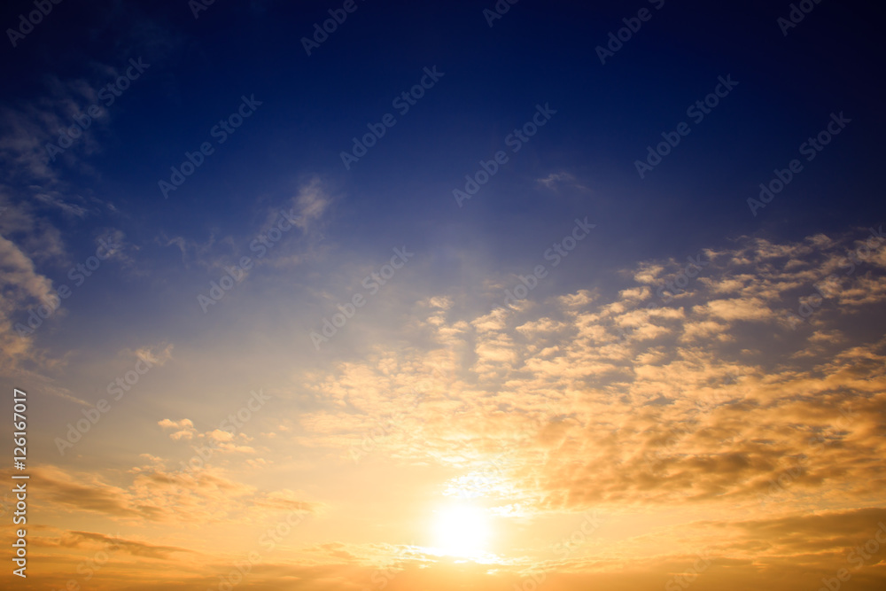 Beautiful landscape with cloudy sky and sunlight at the horizon Beautiful landscape with cloudy sky and sunlight at the horizon